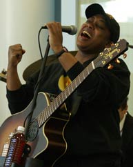 Photograph: Michelle King rocks out on stage.